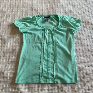 Karen Scott mint green top.